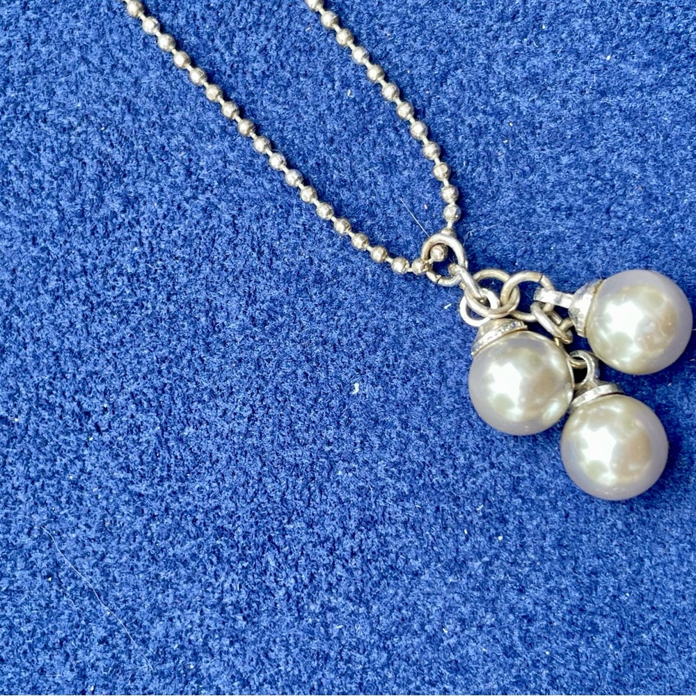 Silver necklace with three silver balls